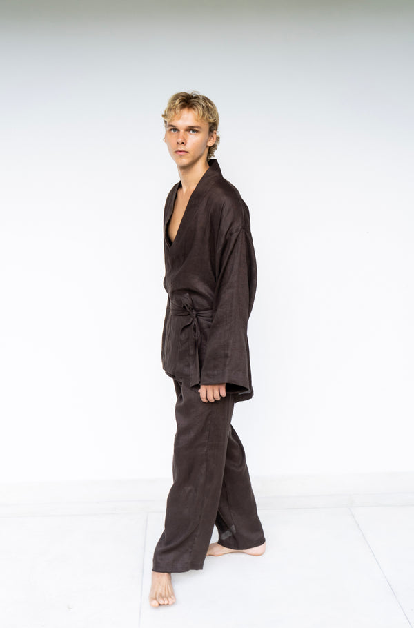 A man model wearing a dark brown Shen pant